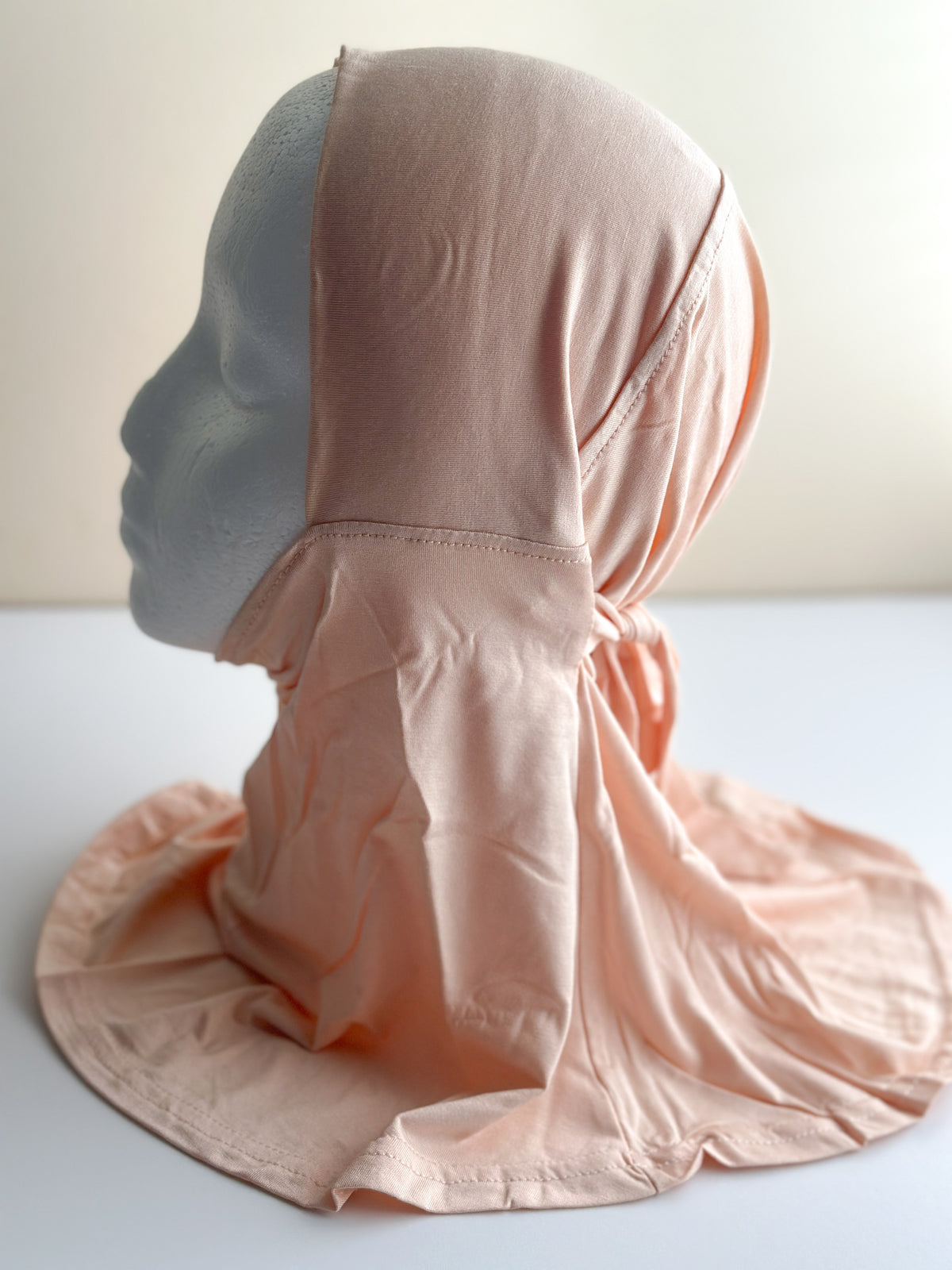 Nude bamboo jersey ninja undercap with adjustable ties
