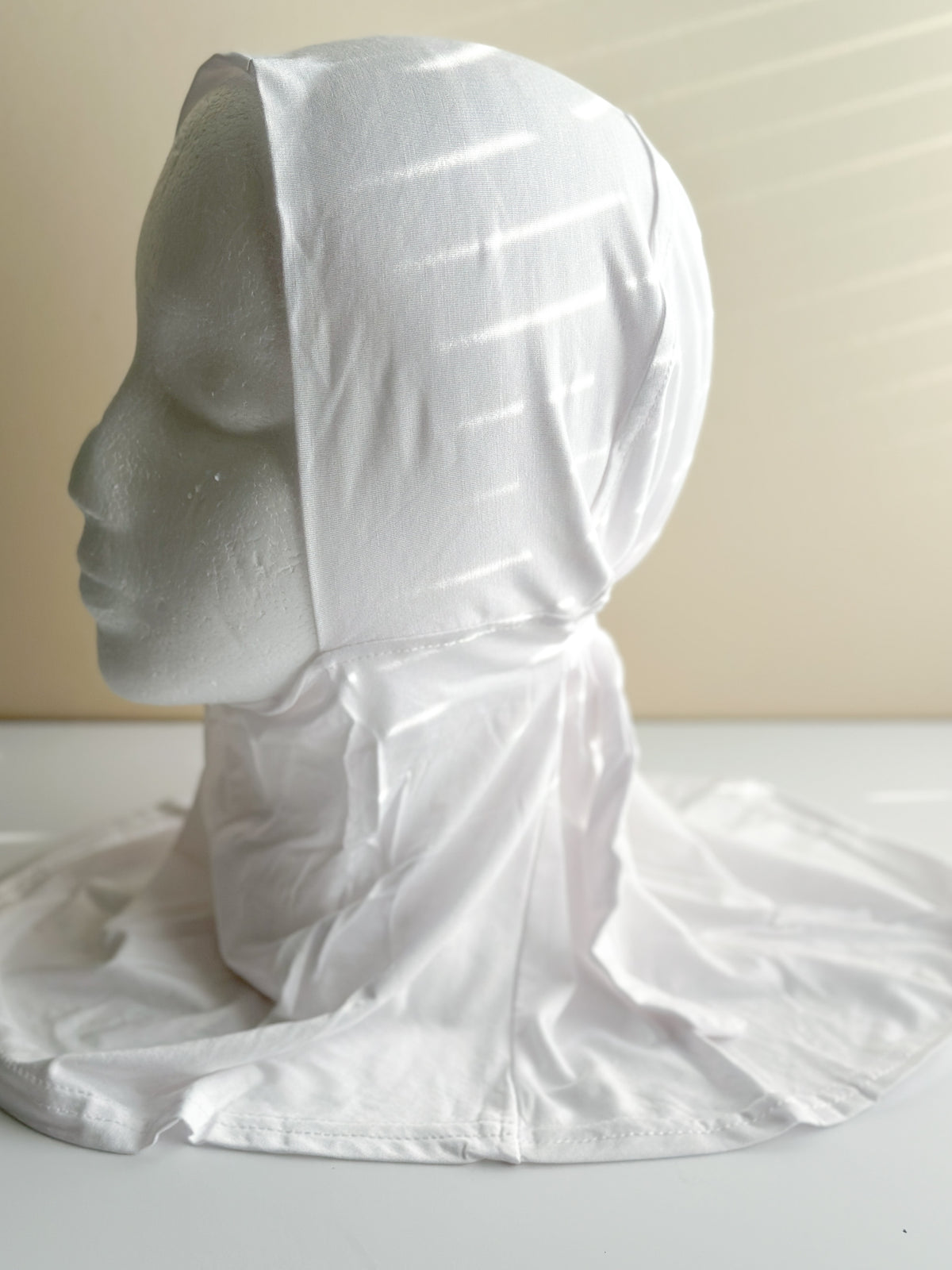 White bamboo jersey ninja undercap with adjustable ties